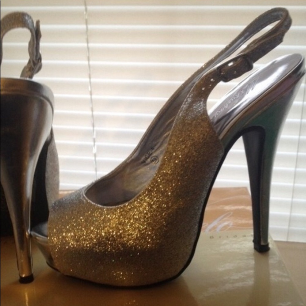 Michelangelo silver heels